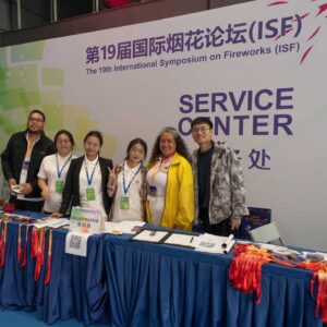 A group of people in front of a service desk